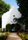 Rust en Vrede Wine Estate surrounded by lush greenery.