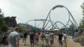 Rust, Germany - july 23, 2014 - Guests walk across a large square at Europa Park In the background you can see the Bluefire roller