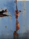 Rust and pealed paint on an old abandoned train