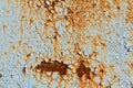 Rust, rusty background, rusty metal texture with remnants of blue paint, rust protruded through the paint Royalty Free Stock Photo