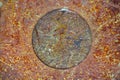 Rust steel texture background with circle in middle. Corrosive damage metal