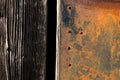 Rust texture. Grunge rusted metal, nails and older wood plank, rust and oxidised metal background. Old metal iron panel. Royalty Free Stock Photo