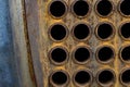 Rust tube sheet of the heat exchanger for maintenance, the water heater in the boiler as background