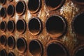 Rust tube sheet of the heat exchanger for maintenance, the water heater in the boiler as background with warm Contrast tone