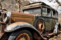 Rusted abandoned antique car