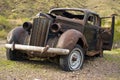 Rusted Abandoned Car in Desert Royalty Free Stock Photo