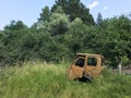 A rusted, abandoned truck in the Ukrainian countryside near Chernobyl