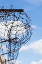 Rusted barb wire on a wall at an old prison Royalty Free Stock Photo