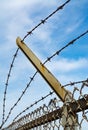 Rusted barbed wire fence Royalty Free Stock Photo