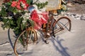 Rusted bike decorated with Christmas ornaments