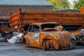 Rusted burnt out car wrecks