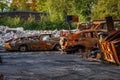 Rusted burnt out car wrecks