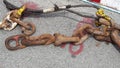 The rusted chain was broken with the wire rope. Royalty Free Stock Photo