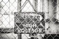 Rusted Danger Sign on a Chain-link Fence Royalty Free Stock Photo