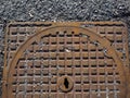 rusted drain manhole Royalty Free Stock Photo