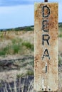 Rusted and Faded Derail Railroad Sign Royalty Free Stock Photo