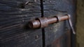 Rusted handle on old wooden door Royalty Free Stock Photo