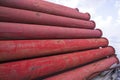 Rusted iron steel metal pipes stack an industrial field Royalty Free Stock Photo