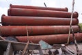 Rusted iron steel metal pipes stack an industrial field Royalty Free Stock Photo
