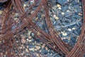 Rusted iron wire found on the stony ground of the desert Royalty Free Stock Photo