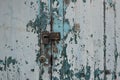 Rusted keys to lock vintage old green wood door Royalty Free Stock Photo