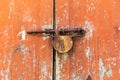 Rusted lock on an old door in the medieval hill town of Francavilla di Sicilia