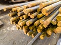 rusted long round steel bars pack - close-up with selective focus Royalty Free Stock Photo