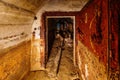 Rusted metal armored door in old abandoned dirty Soviet bunker