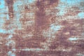Rusted metal with blue paint. Rust and oxidized metal background. Old metal surface, closeup, texture. Royalty Free Stock Photo