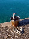 Rusted Metal Bucket and Sea water