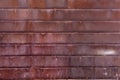 Rusted metal wall texture. Oxidized metal fence background