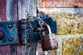 Rusted padlock and hasp