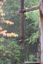 Rusted pipeline with shut-off valve in a disused factory