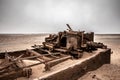 The rusted remains of an abandoned oil drilling rig between Henties Bay and Torra Bay, Skeleton Coast, Namibia. Royalty Free Stock Photo