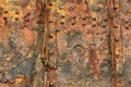 Rusted riveted steel hull. Abstract, background. Royalty Free Stock Photo