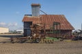 Rusted roof farm house and farming tools Oregon Royalty Free Stock Photo