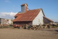 Rusted roof farm house and farming tools Oregon Royalty Free Stock Photo