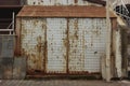 Rusted storage door with stain Royalty Free Stock Photo