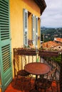 A rusted table on a small terrace in a typical French provence town, Mougins