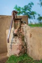 Rusted traditional old hand operated water pump at Egyptian rural village