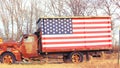 Rusted Truck with American Flag a patriotic image