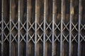 Rusted vintage folding old metal door gate background