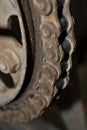 Rusted wheel chain with oil and sand