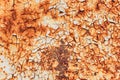 Rusted white painted metal wall. Rusty metal background with streaks of rust. Rust stains. The metal surface rusted Royalty Free Stock Photo
