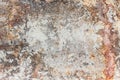 Rusted white painted metal wall. Rusty metal background with streaks of rust. Rust stains. The metal surface rusted Royalty Free Stock Photo