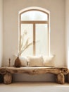 Rustic aged wood log bench near beige stucco wall. Boho interior design of modern living room with arched window