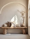 Rustic aged wood log bench near beige stucco wall. Boho interior design of modern living room with arched window