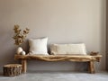 Rustic aged wood log bench near stucco empty wall with copy space. Boho interior design of modern living room