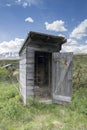 Rustic outhouse in summer