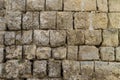 Rustic ancient handcrafted stone wall in Matera, italy